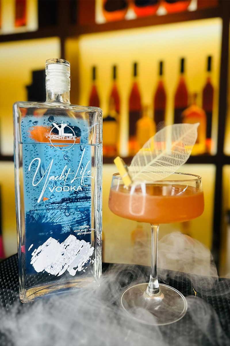 one-love-carlos-mogollon Beauty shot of a drink named "Sweet 16", created by Phil Fuentes, Yacht Life Vodka's Bartender of the Month